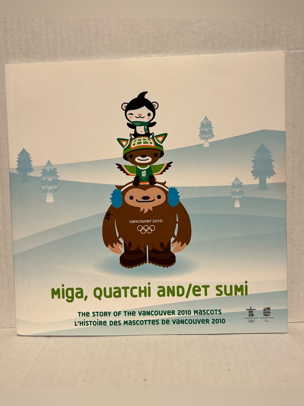 Storybook: Miga, Quatchi and/et Sumi: The Story of the Vancouver 2010 Mascots.